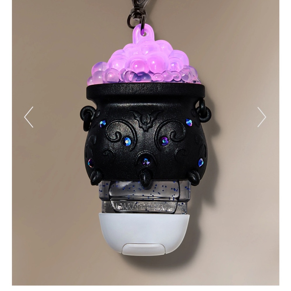 Light-Up Color-Changing Spooky Cauldron Black and Purple Sanitizer Holder